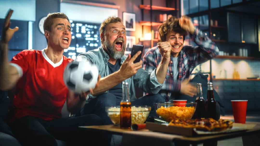 images/group-people-watching-football-game-sports-bar.jpg