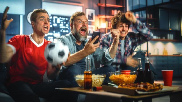 images/group-people-watching-football-game-sports-bar.jpg